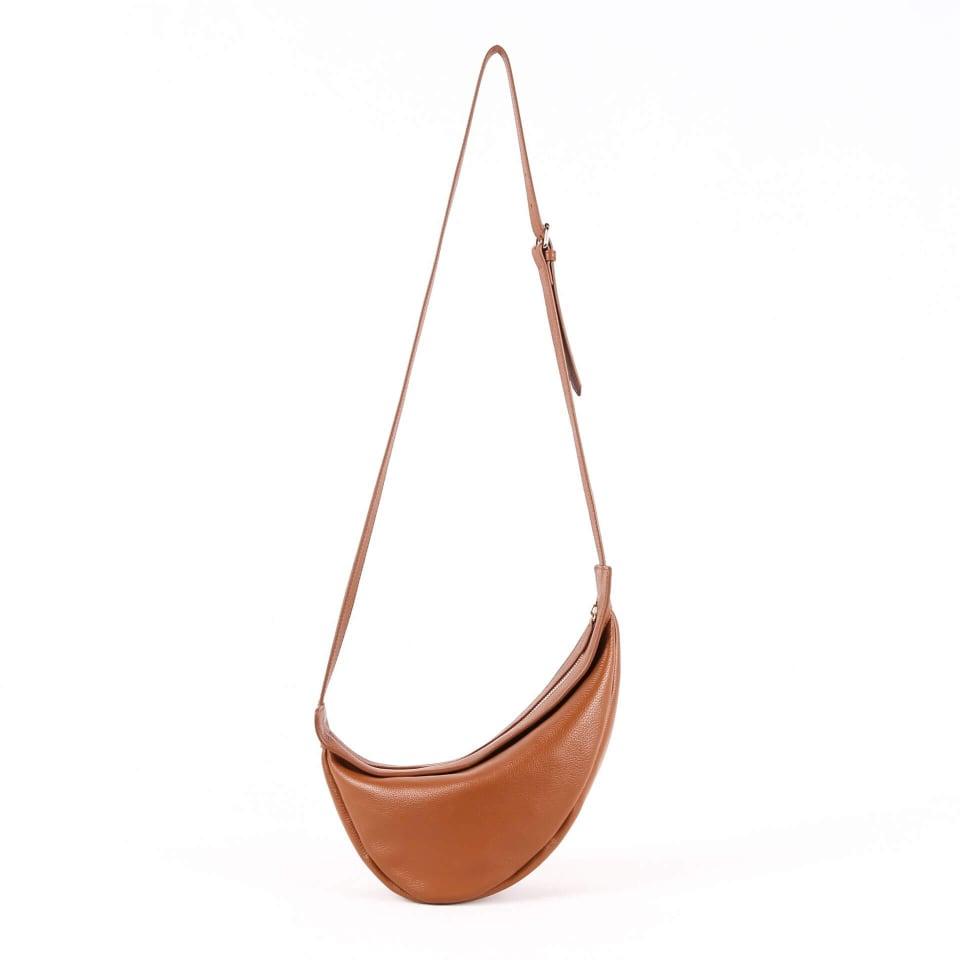 The Row Slouchy Banana Small Crossbody Bag in Brown